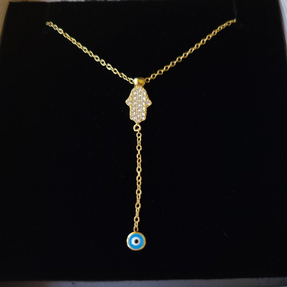 pave Hamsa center and a Evil Eye charm enamel drop